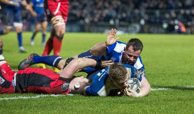 Bryan Byrne congratulates try scorer Dan Leavy