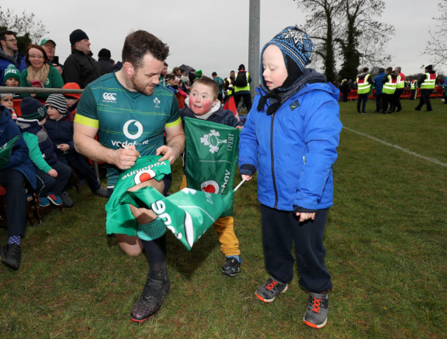 Can Healy signs autographs for fans