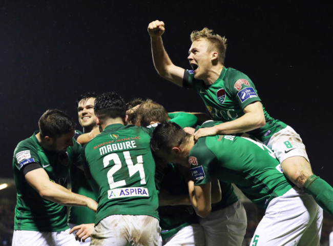 Kevin O'Connor celebrates scoring their second goal from a free kick with teammates