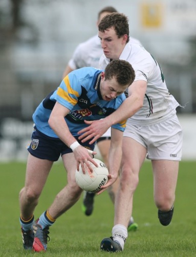 Sean Hurley tackles Jack McCaffrey