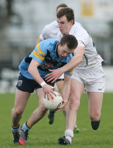 Sean Hurley tackles Jack McCaffrey