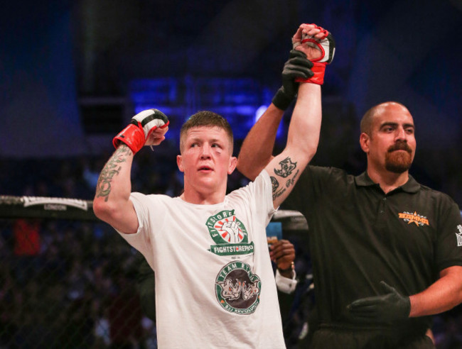 Paul Redmond celebrates winning the fight