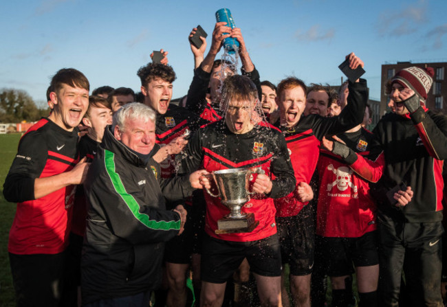 Sean O'Mahony is presented with the Collingwood Cup