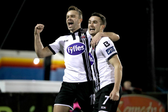 Robbie Benson celebrates scoring with Michael Duffy