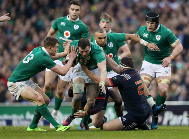 Robbie Henshaw is tackled by Guilhem Guirado