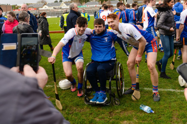 Aaron Gallagher and Cian Lynch with Jamie Wall after the game