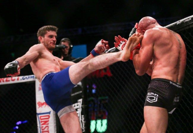 Peter Queally in action against Joe McColgan