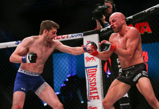 Peter Queally in action against Joe McColgan