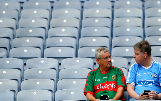 A Mayo and Dublin fan chat after the game