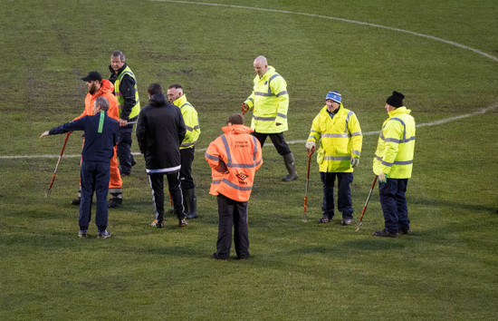 Work is done on the pitch ahead of the game