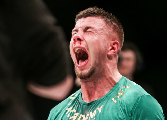 Karl Moore celebrates his unanimous decision victory