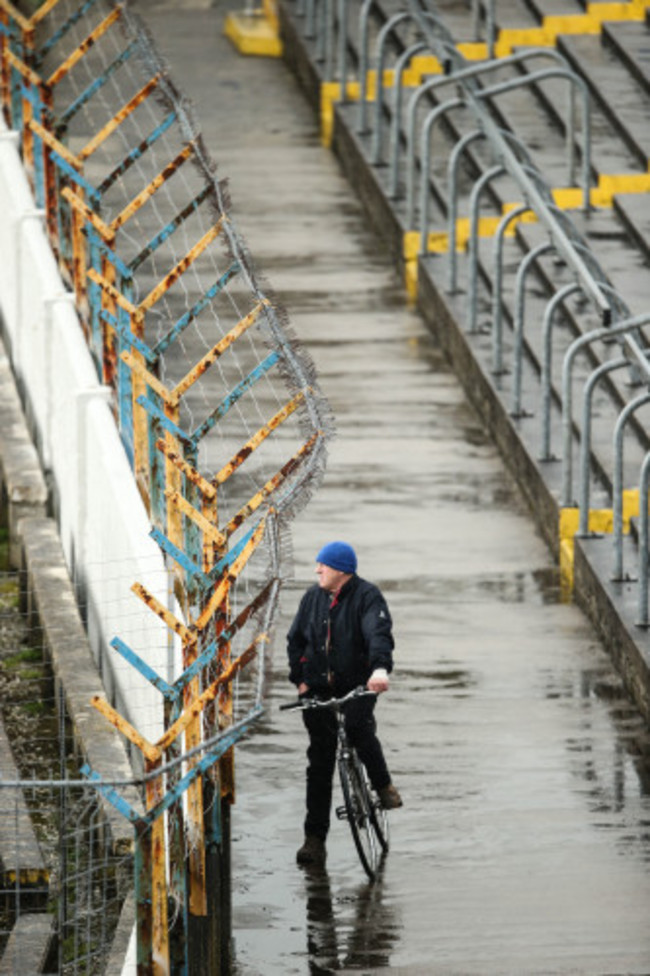 A Tipperary supporter watches the match from the terrace