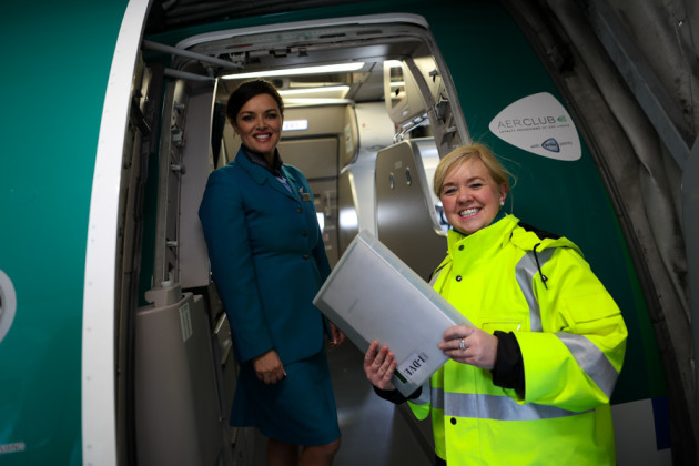 Turnaround Coordinator Eileen Quinn liaises with Cabin Service Manager Fiona Power ahead of Aer Lingus flight EI162 which departed for London Heathrow from Dublin at noon today.