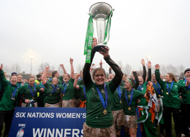 Fiona Coghlan lifts the cup