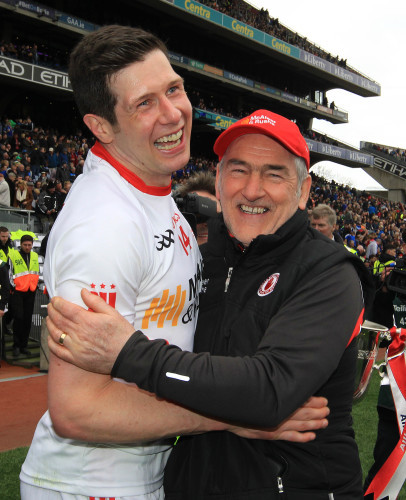 Sean Cavanagh and Mickey Harte celebrate after the game