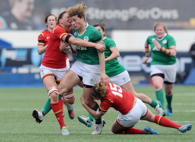 Jenny Murphy is tackled by Dyddgu Hywel and Rachel Taylor