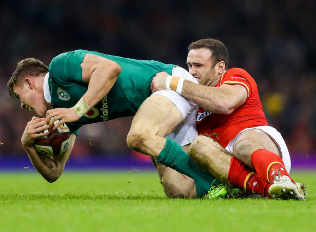 Garry Ringrose tackled by Jamie Roberts