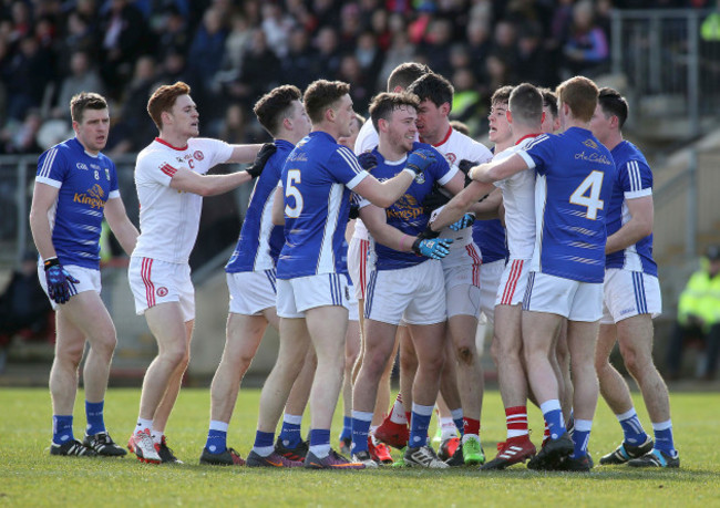 Tyrone and Cavan players tussle