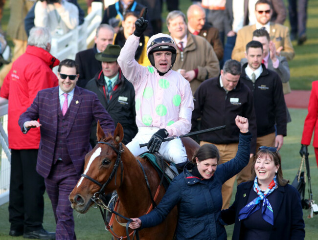 Ruby Walsh celebrates winning the Mares' Novices Hurdle on Limini