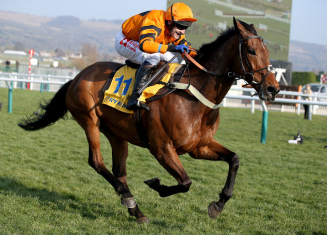 Thistlecrack ridden by Tom Scudamore on the way to winning the Ryanair World Hurdle