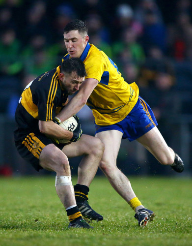 John Payne is tackled by Conor Gleeson