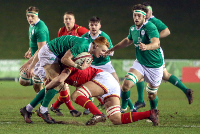 Ciaran Frawley is tackled by Shane Lewis-Hughes