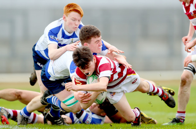 Luke Kelly scores his sides opening try despite Odhran Dooley and Shane Jennings