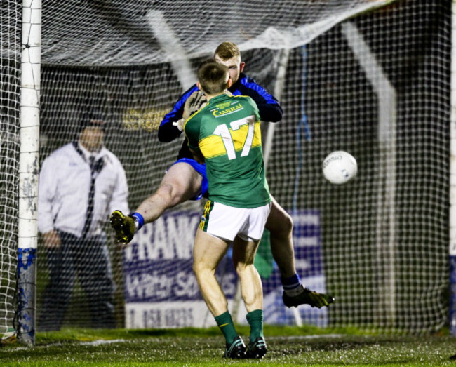 Killian Spillane punches into the net for the first goal