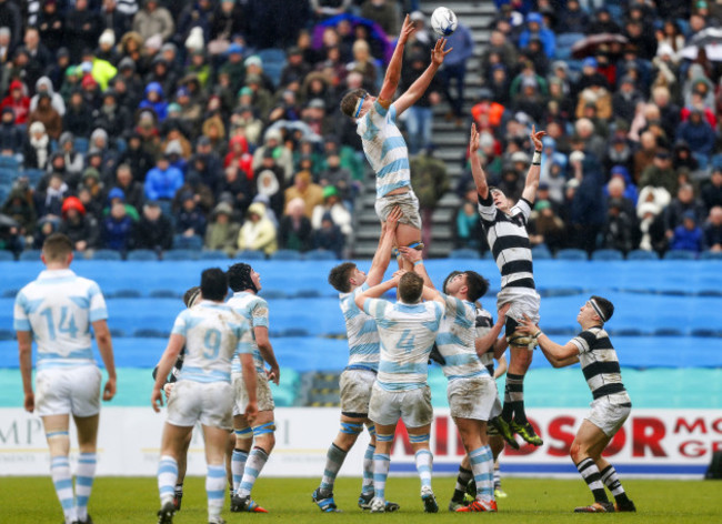 College's Charlie Ryan wins a lineout ahead of Oran O’Brien