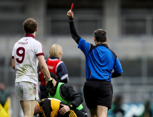 Padraig Cassidy is red carded by Maurice Deegan