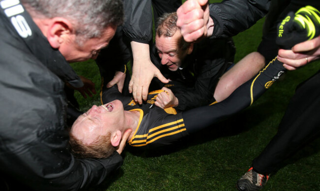 Colm Cooper celebrates with manager Pat O'Shea at the final whistle