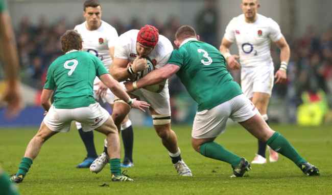 James Haskell tackled by Kieran Marmion and Tadhg Furlong