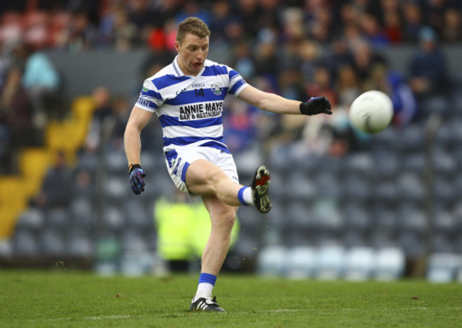 Brian Hurley kicks a free kick