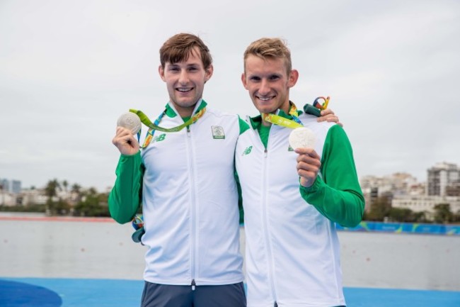Gary and Paul O'Donovan celebrate winning a silver medal