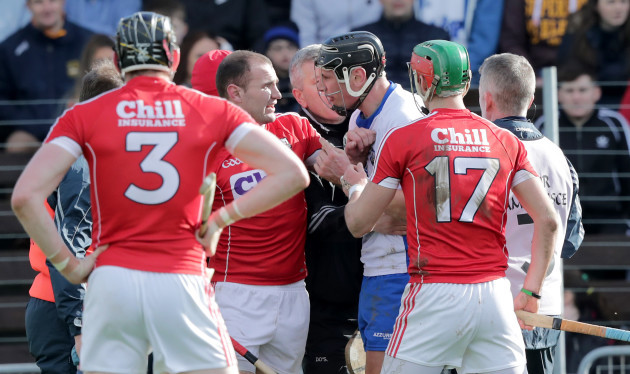 Maurice Shanahan confronts Dean Brosnan after being shown a red card
