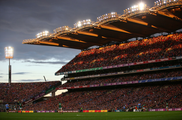 General view of the match as the sun goes down