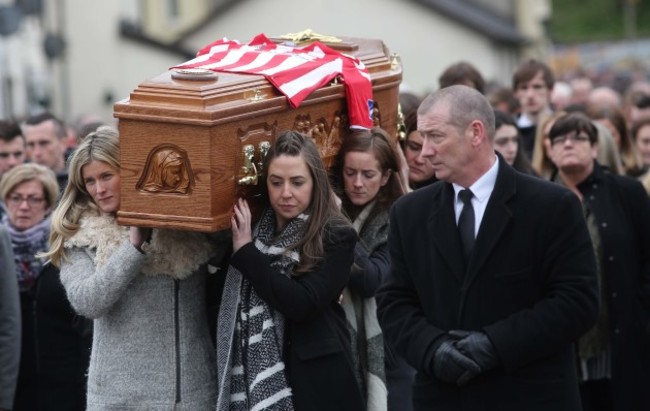 The remains of the late Derry City captain, Ryan McBride, are carried by his sisters Caitlin, Colleen, Siunin