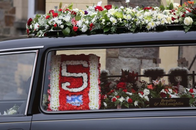 Flowers showing the shirt number of late Ryan McBride