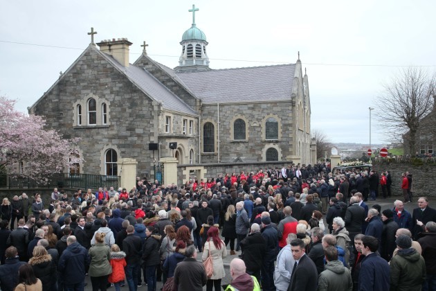The family and friend's of Derry City captain, Ryan McBride follow the hearse