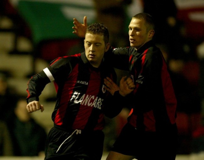 Vinny Perth is congratulated by Sean Prunty 3/4/2004