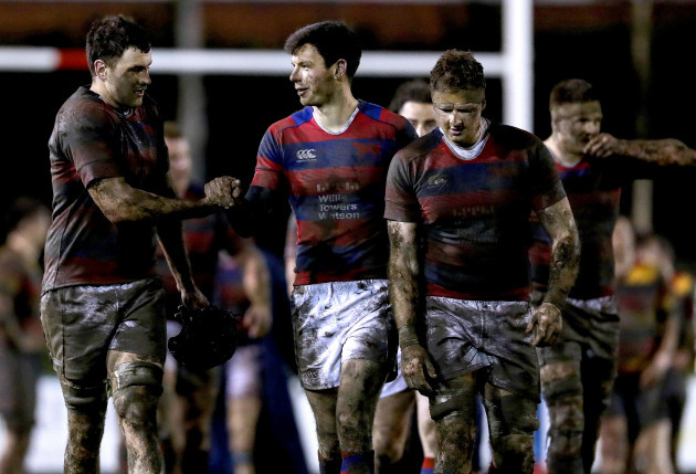 Ben Reilly, Matt Darcy and Michael Noone celebrate after the game