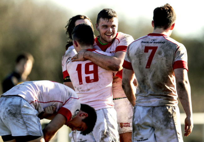 Kyle Dixon celebrates at the end of the game with Rowan Osbourne