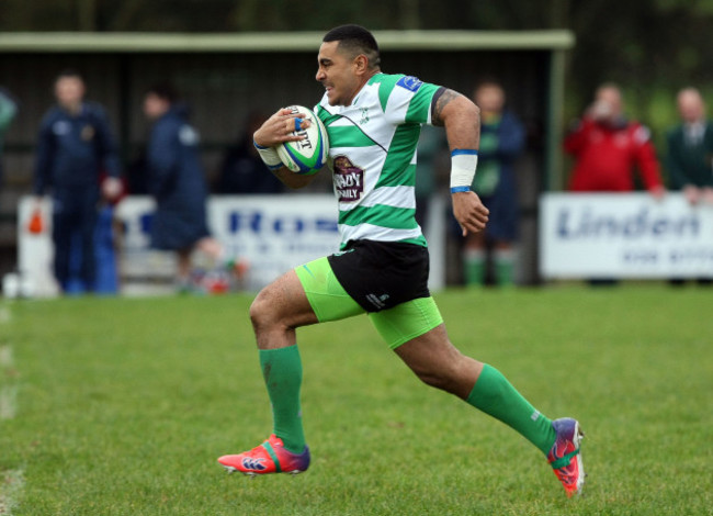 Paulie Tolofua runs in for a try