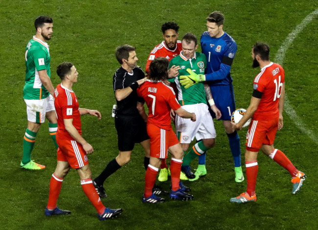 Glenn Whelan has a tussle with Joe Allen