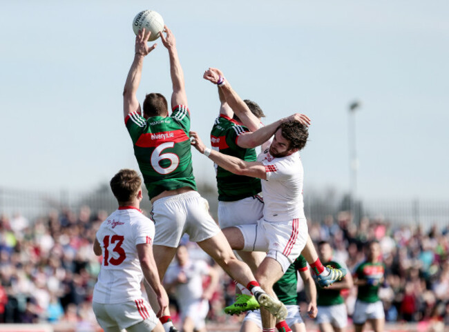 Ronan McNamee in action with Lee Keegan