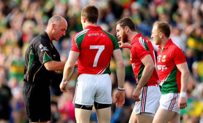 Donal Vaughan and Keith Higgins speak to referee Cormac Reilly