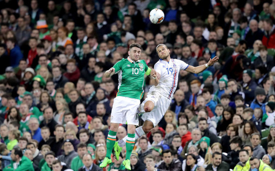 Robbie Brady with R&uacute;rik G&iacute;slason
