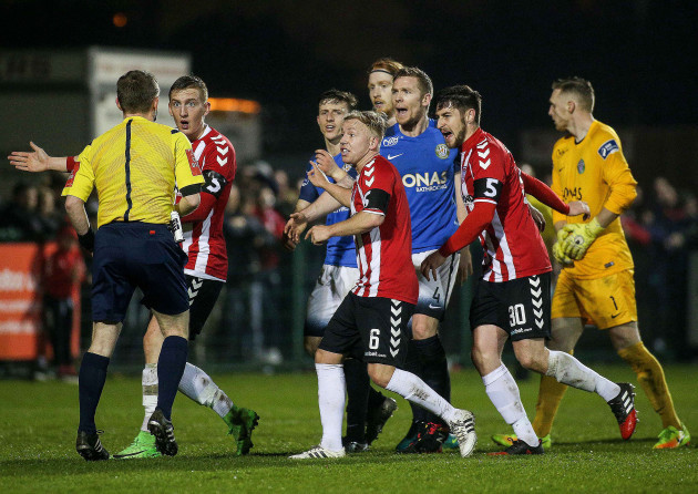 Bray players appeal to referee Derek Tomney after he awarded a penalty against them