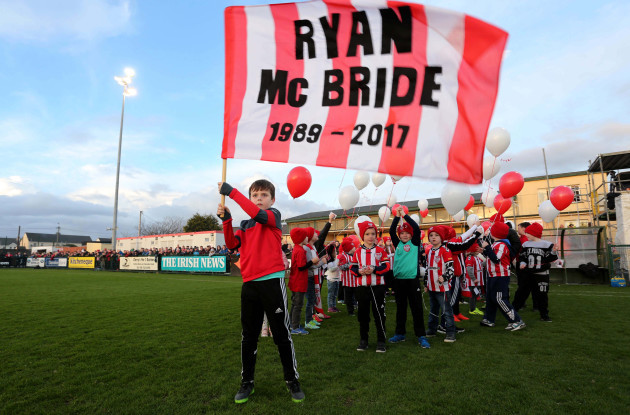 Members of the Derry City FC Cubs who released balloons in memory of club captain Ryan McBride prior to kick off