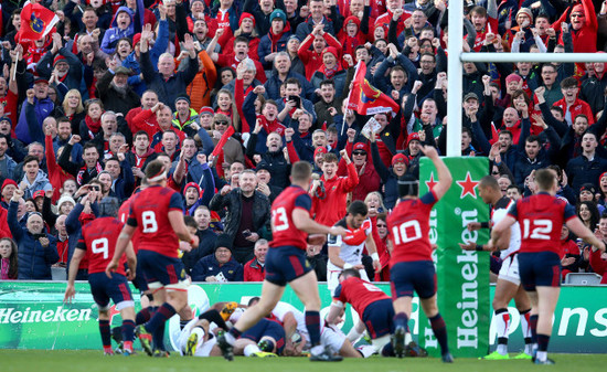 Munster fans celebrate John Ryan scoring a try